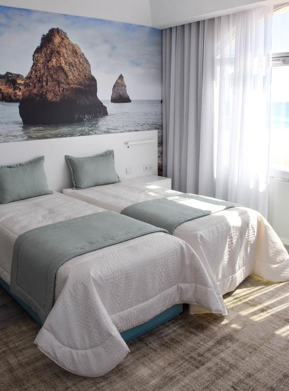 Golden Beach Guest House & Rooftop Bar Faro Exterior photo