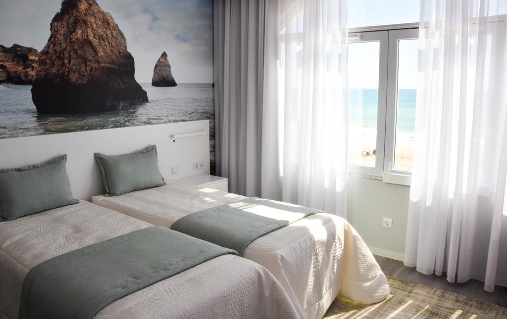 Golden Beach Guest House & Rooftop Bar Faro Exterior photo