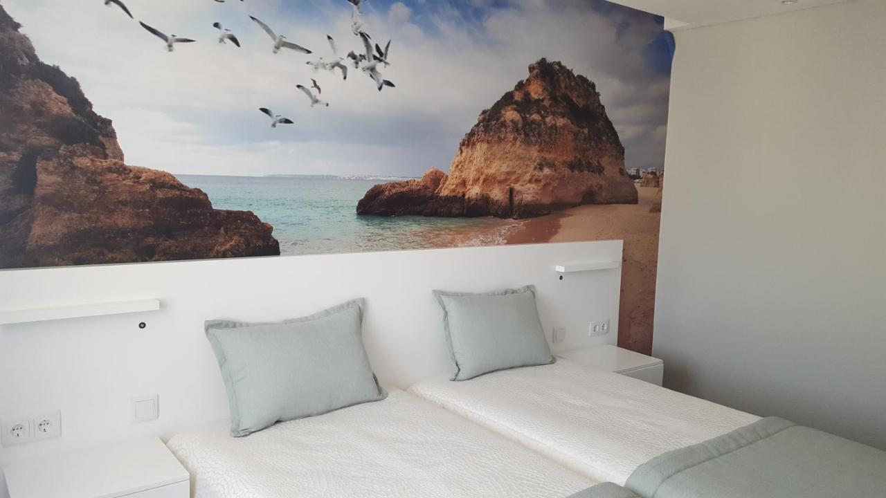 Golden Beach Guest House & Rooftop Bar Faro Exterior photo