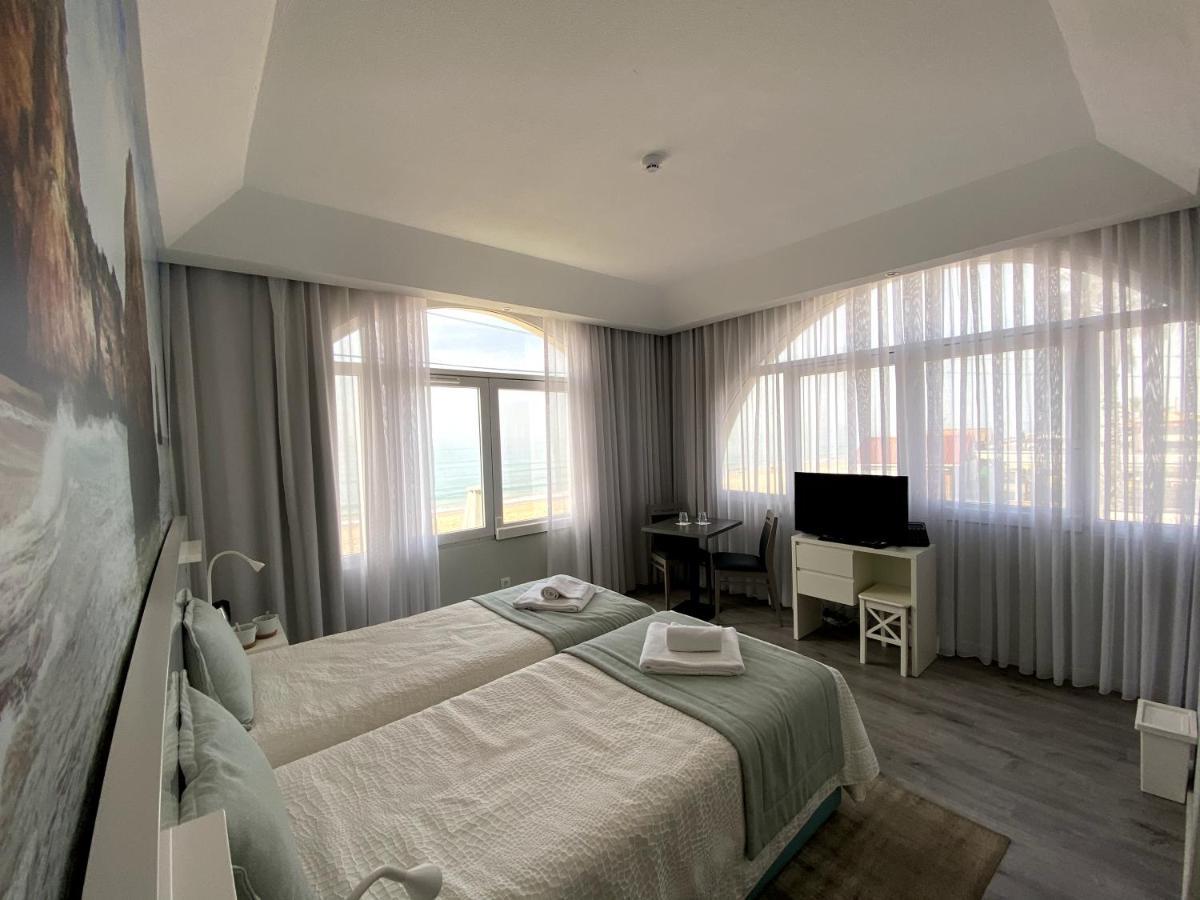 Golden Beach Guest House & Rooftop Bar Faro Exterior photo