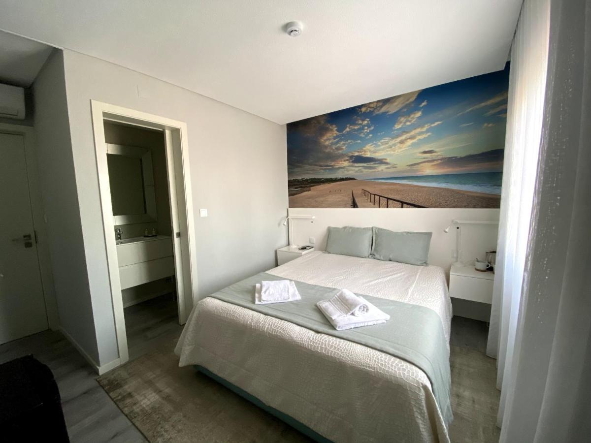 Golden Beach Guest House & Rooftop Bar Faro Exterior photo