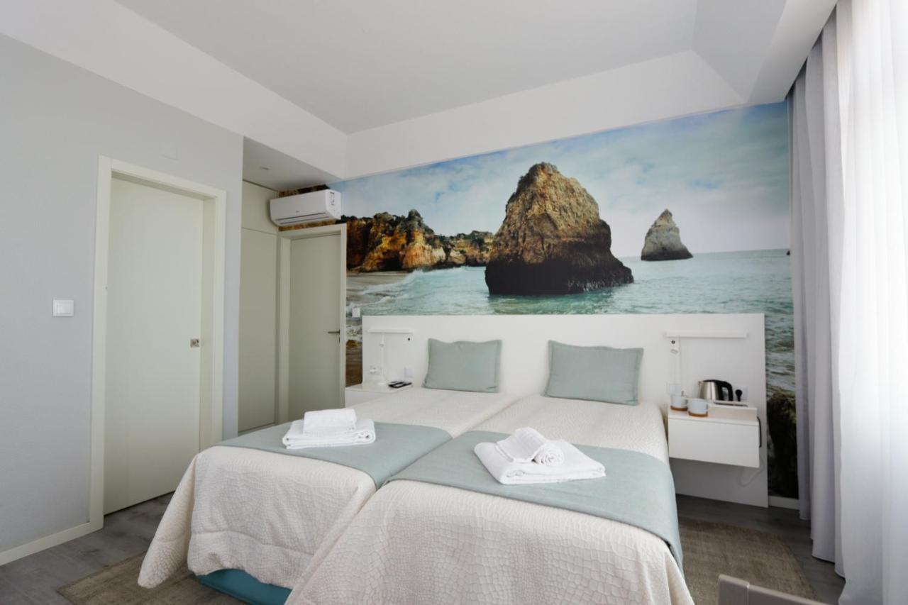 Golden Beach Guest House & Rooftop Bar Faro Exterior photo
