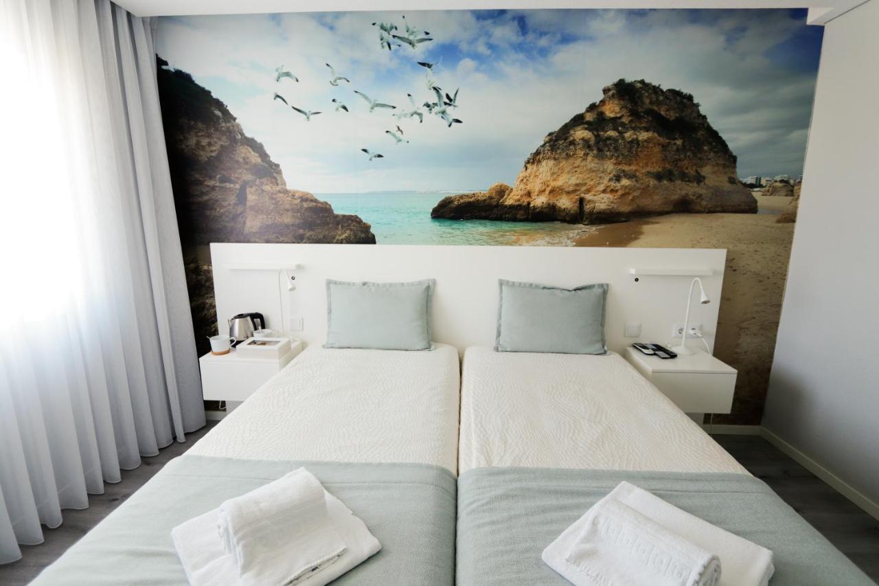 Golden Beach Guest House & Rooftop Bar Faro Exterior photo